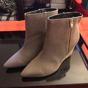 Sole Diva heeled booties faux suede and snakeskin.